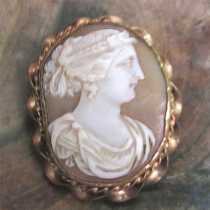Early Victorian 1830-1860 light carved sardonyx shell. Unmarked Gold/Gold plated twisted rope brooch.