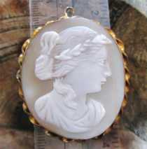Victorian 1850-1870 Hand carved Big Light Sardonyx Shell. Unmarked Gold/Gold plated twisted rope pendant.