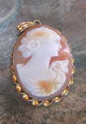Well hand carved Carnelian shell circa 1920-1935. Marked Gold Filled Pendant. Hidden 2nd window.