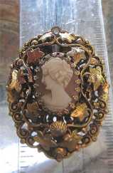 Well hand carved Art Deco shell circa 1920-1935. Unmarked filigree Gold Filled Pendant/Brooch.