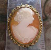 1920-1935 Greatly hand carved Carnelian shell. Gold washed twisted rope pendant/brooch