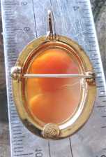 Superiorly hand carved Carnelian shell circa 1955. Marked 12K Gold Filled brooch/pendant.