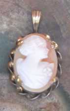 Tiny Hand carved & signed Conch shell. Gold Filled Pendant circa 1925.