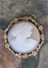 Well Hand carved shell circa 1915-1935. Gold Filled ?) decorative grapes & flowers Pendant.