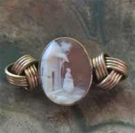 Well carved Antique shell Woman in the country landscape Gold(?)/Gold Filled rear design Brooch. Circa 1890-1910.
