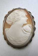 Hand carved shell - circa 1925 Psyche Goddess. Gold(?)/GP pendant/brooch.
