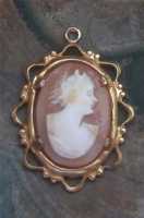 Hand carved shell Diana Goddess - circa 1910th-1920th. Unmarked Gold(?)/Gold Filled filigree pendant.