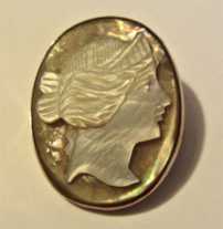 Nice hand carved Mother Pearl shell Gold or Gold gilded Brooch. Newer pin & clasp. Circa 1915