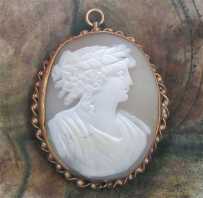 Sardonyx shell Greatly hand carved woman with wreath Classic. Gold(?)/Gold Plated twisted rope brooch/pendant 1835-1865