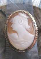 Hand carved Art Deco shell - profile circa 1910th-1920th. Unmarked Gold washed decorated brooch/pendant