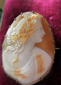 Bacchante a priestess of Bacchus. Carnelian Shell Cameo Brooch Gold or Gold Plated Bezel. Circa 1895