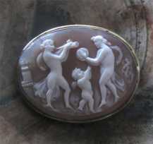 Hand carved Classic Roman Bacchanalia festival of Bacchus Circa 1910th Gold Plated pendant/brooch.