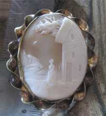 Hand carved Antique shell Woman in the country landscape Gold (?)/Gold Filled twisted rope Brooch. Circa 1870-1890.