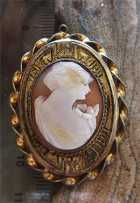 Post Edwardian carved/signed shell with girlish profile. Art Deco Gold washed pendant circa 1910th - 1920th.