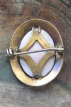 Hand carved & signed Coral stone Psyche Goddess. Unmarked Silver/Gold(?) decorated 1910th brooch.