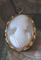 Hand Carved/signed light shell with woman’s profile. 12K Gold filled pendant/brooch circa 1930th-1950th.