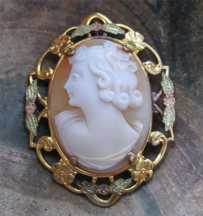 Cute profile - greatly carved/signed shell from 1930th. Set in 3 colored hallmarked 12K Gold Filled decorative brooch.