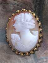 Hand Carved/signed shell - Post Edwardian girl . Gold Filled pendant/brooch circa 1920th.