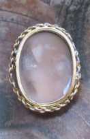 Hand Carved/signed shell - Post Edwardian girl . Gold plated(?) ring top circa 1920th.