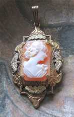 Hand Carved circa 1920th shell - late Art Deco. Multicolored Gold plated pendant