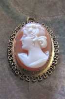 Hand Carved tiny detailing shell - left faced profile. Gold Filled filigree pendant circa 1930th.