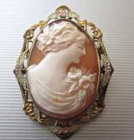 Well carved Carnelian shell embedded in filigree colored Gold & GF Brooch/Pendant circa 1930