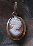 Hand Carved tiny shell profile circa 1930th. 12K Hallmarked Gold Filled pendant
