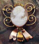 Ribbon shaped 12K Gold Filled brooch/pendant Circa 1930th-1950th. Hand carved shell.