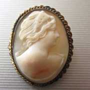 Nice hand carved Light Sardonyx shell Signed by the Artist “G” Gold washed Brooch. Old”C” stile clasp. Circa 1915