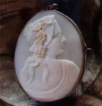 Greatly hand carved Huge shell - Bacchante circa 1890th-1910th. Set in hallmarked Gold(?)/Gold Plated brooch/pendant.