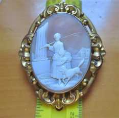 Museum Quality carved shell - A woman at colon with dog. Huge Antique Pinchbeck Brooch. Circa 1850-1880.