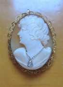 Hand carved shell circa 1940th, with a little diamond Marked 12K Gold filled filigree pendant/brooch