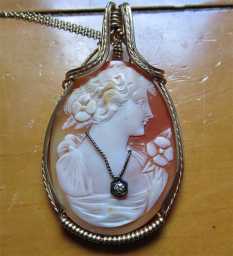 Quality shell carved/signed with old European Diamond Circa 1920th. 14K Gold Rolled pendant & 18” chain.