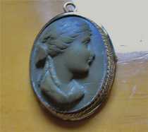 Victorian 1855 - 1885 greatly carved portrait - lava shell. Unmarked Gold(?)/Gold plated brooch/pendant from UK.