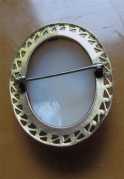 Hand carved/signed Art Deco shell 1910th-1930th. Gold(?)/Gold filled brooch from USA.