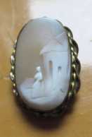 Circa 1880 Victorian carved shell - woman at the house Small Gold filled(?) bezel twisted rope brooch.