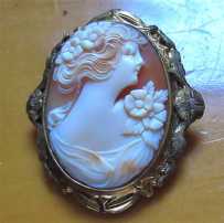 Superiorly hand carved/signed shell circa 1910th - 1930th. Post WWI decorative hallmarked 10K Gold filled brooch.