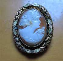 Superiorly hand carved/signed shell circa 1910th - 1930th. Post WWI decorative unmarked vermeil brooch.