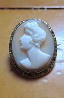 Carved/signed light shell Georgian young man profile. Gold(?)/Gold plated brooch circa 1810th-1820th.