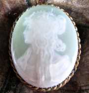 From unique designs of Art Nouveau King Alphonse Mucha. Circa 1907 Very rear colored china brooch in Gold Washed bezel