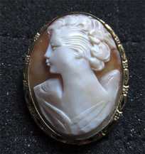 Great hand carved/signed shell circa 1930th - 1950th. Gold(?) or Gold filled unmarked brooch/pendant.