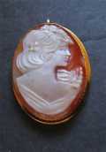 Hand carved/signed Carnelian shell from 1960th. Embedded in Gold filled brooch/pendant.