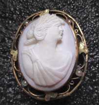 Hand carved/signed Coral stone Ceres circa 1910th-1930th. Gold(?) or Gold filled filigree brooch with pearls.