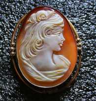 1965-1975 Greatly carved long haired Beauty carnelian shell. 14K Gold filled pendant/brooch, signed by the Artist.