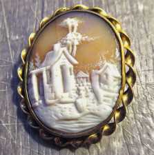 Intricately carved Victorian shell Girl at the village landscape. Gold(?)/Gold Plated(?) Brooch circa 1890th - 1910th.
