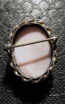 Hand carved/signed 1910th - 1930th coral from UK in unmarked Gold plated Brooch.