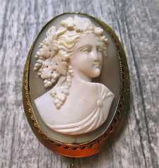 Best hand carved Sardonyx shell Bacchante circa 1910th-1930th. Quality shell in Gold(?)/Gold plated brooch with safety chain.