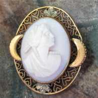 Edwardian, circa 1910 Art Nouveau carved coral Diana. Gold filled filigree with moons Brooch.