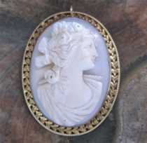 High relief Victorian profile 1890-1910, well carved Coral stone. Unmarked/tested 10K Yellow Gold filigree brooch/pendant /