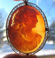 Well carved Edwardian s hell - circa 1910 woman's portrait Hallmarked 10K Yellow Gold filigree Brooch/Pendant.